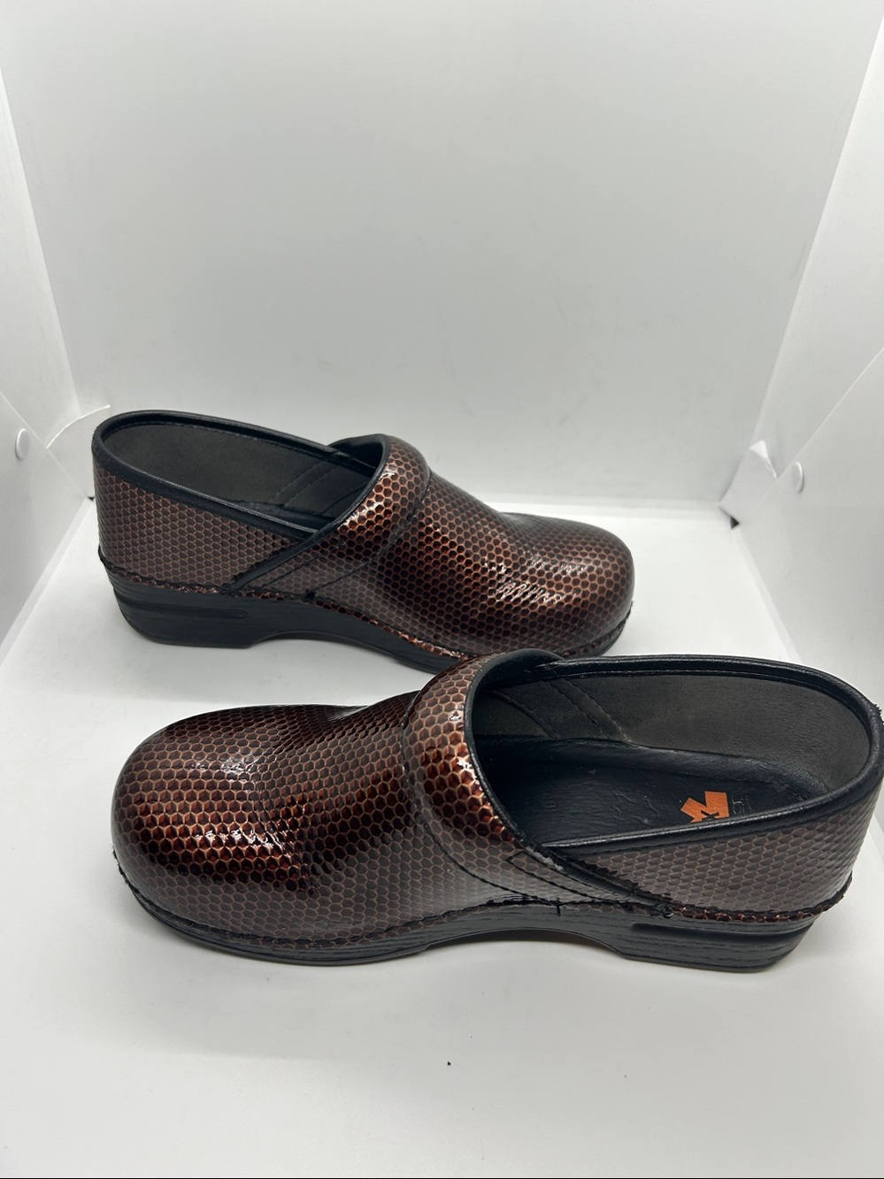Dansko Brown Metallic Hex-Pattern Clogs - Picture 3 of 16